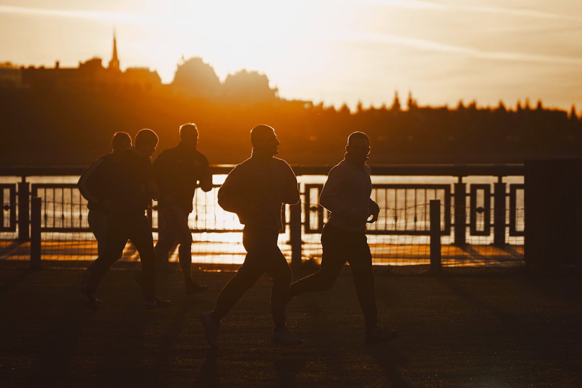 Person jogging in nature representing exercise as frontline treatment for depression
